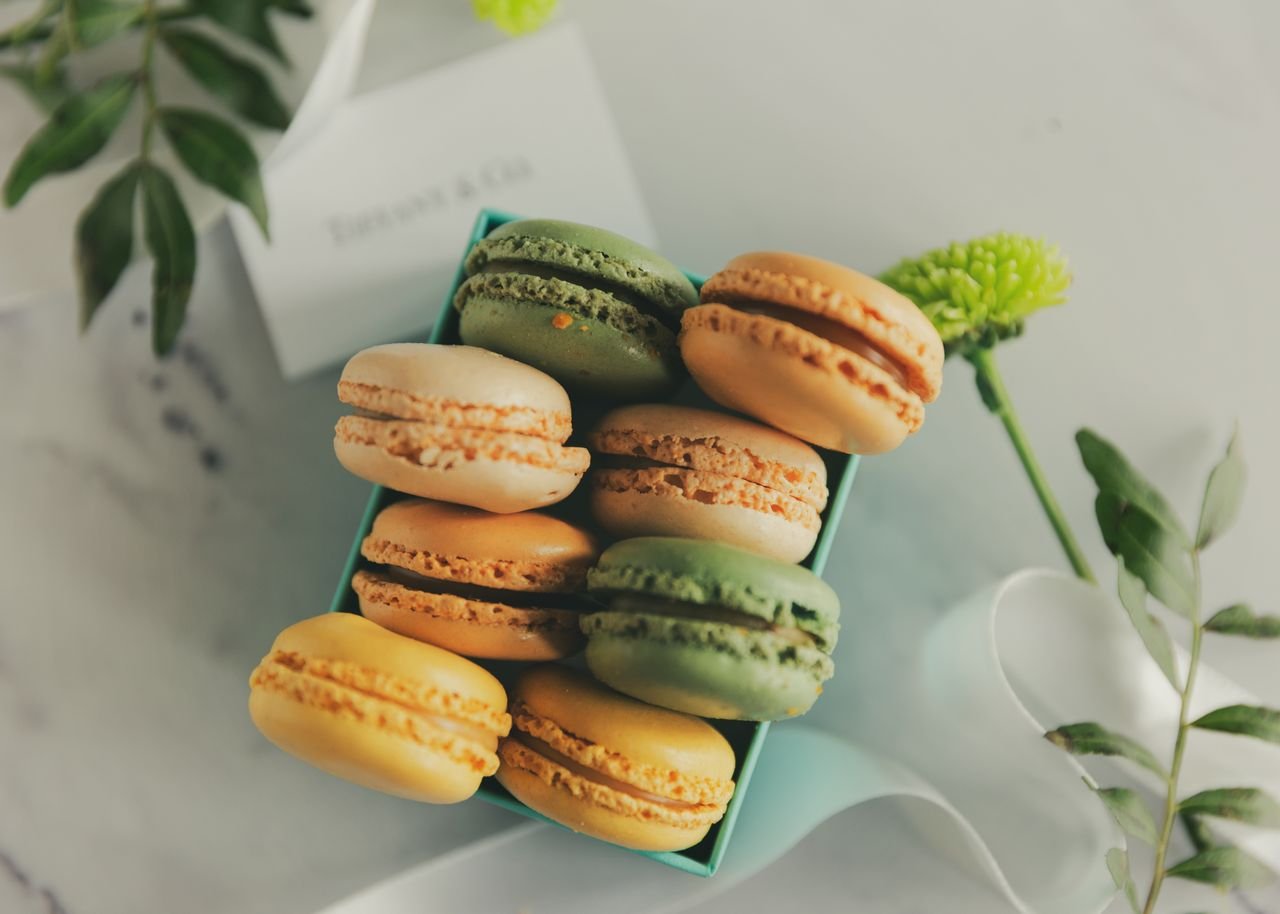 A box of pastel macarons
